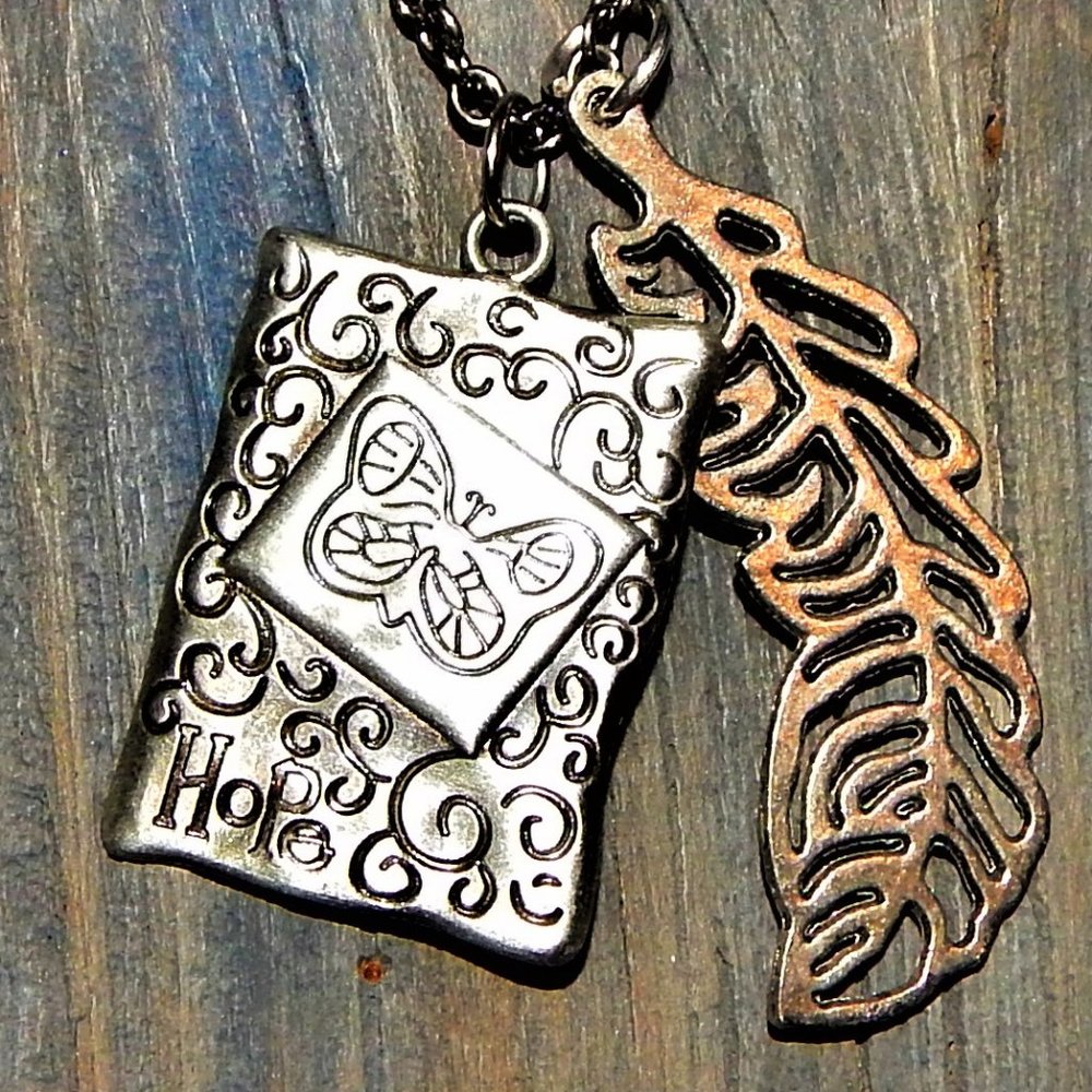 <3  $6 - $12.  Butterfly Hope Feathers Necklace